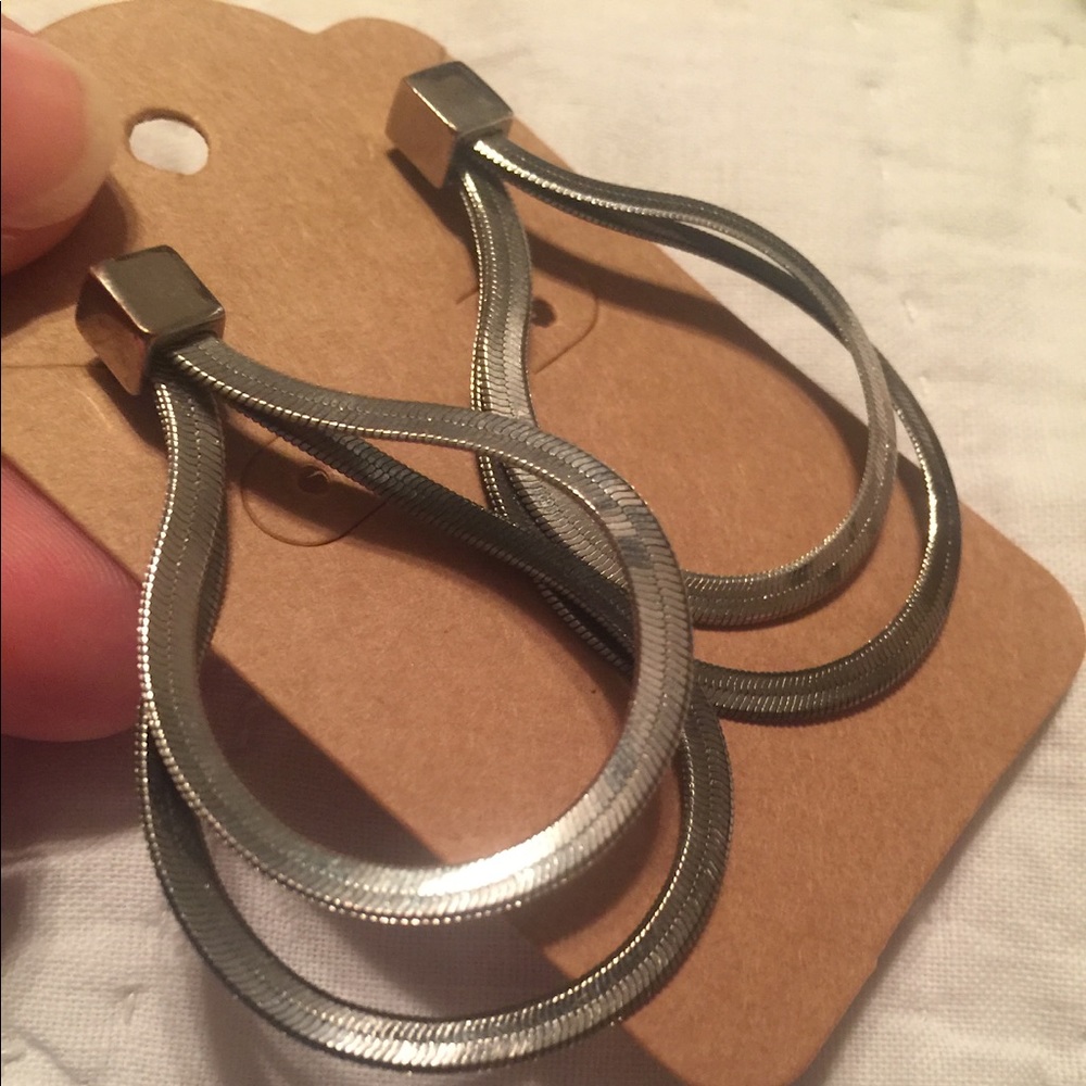 Silver toned loop earrings